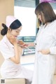 A woman in a white lab coat and a nurse with a stethoscope.